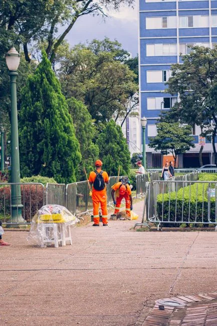 services-01 person-holding-yellow-plastic-spray-bottle-zmnefoi3k